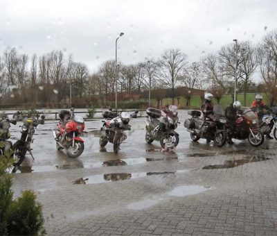 Motorcycle Riding In The Rain And Wind